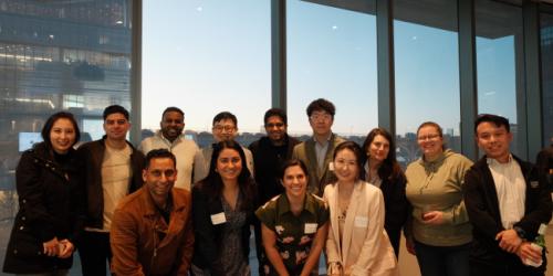 Thursday, April 17, 2025 AI Impact Challenge  panelists with students after the AI Impact Challenge 