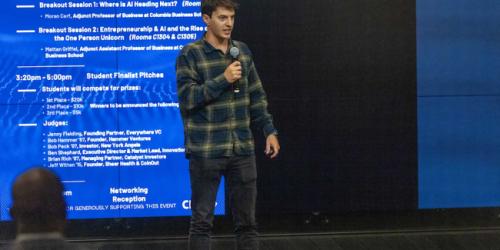 Friday, April 25, 2025 AI Start-Up Challenge: Future of Finance A speaker at the AI Startup Challenge addressing the crowd